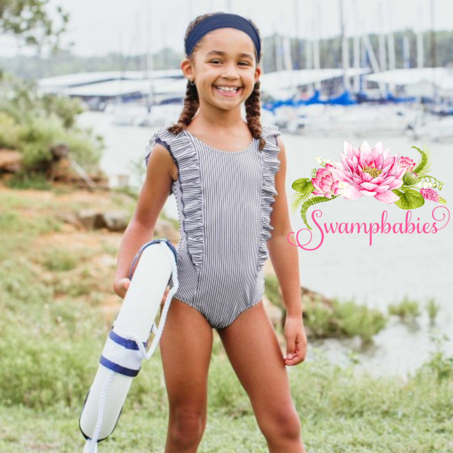 RuffleButts Navy Stripe Waterfall One-Piece Swimsuit