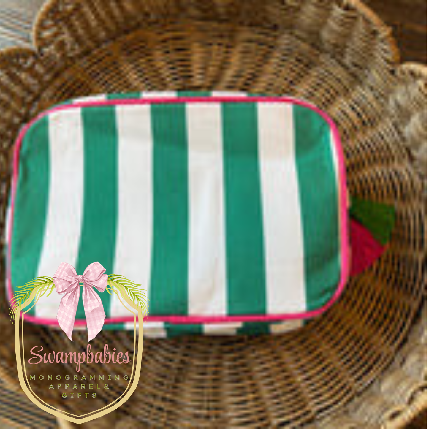Green and white striped pouch with pink trim 